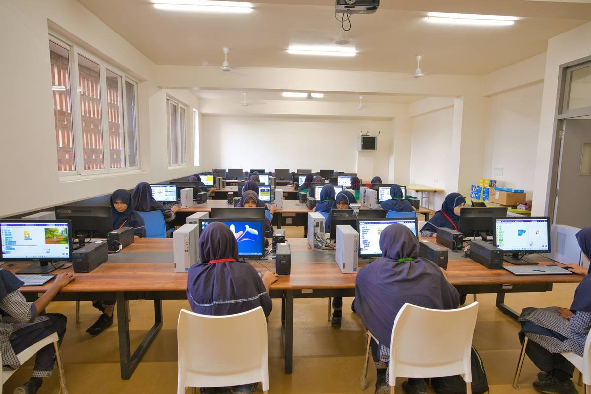Student debugging C++ game code as part of projects development education